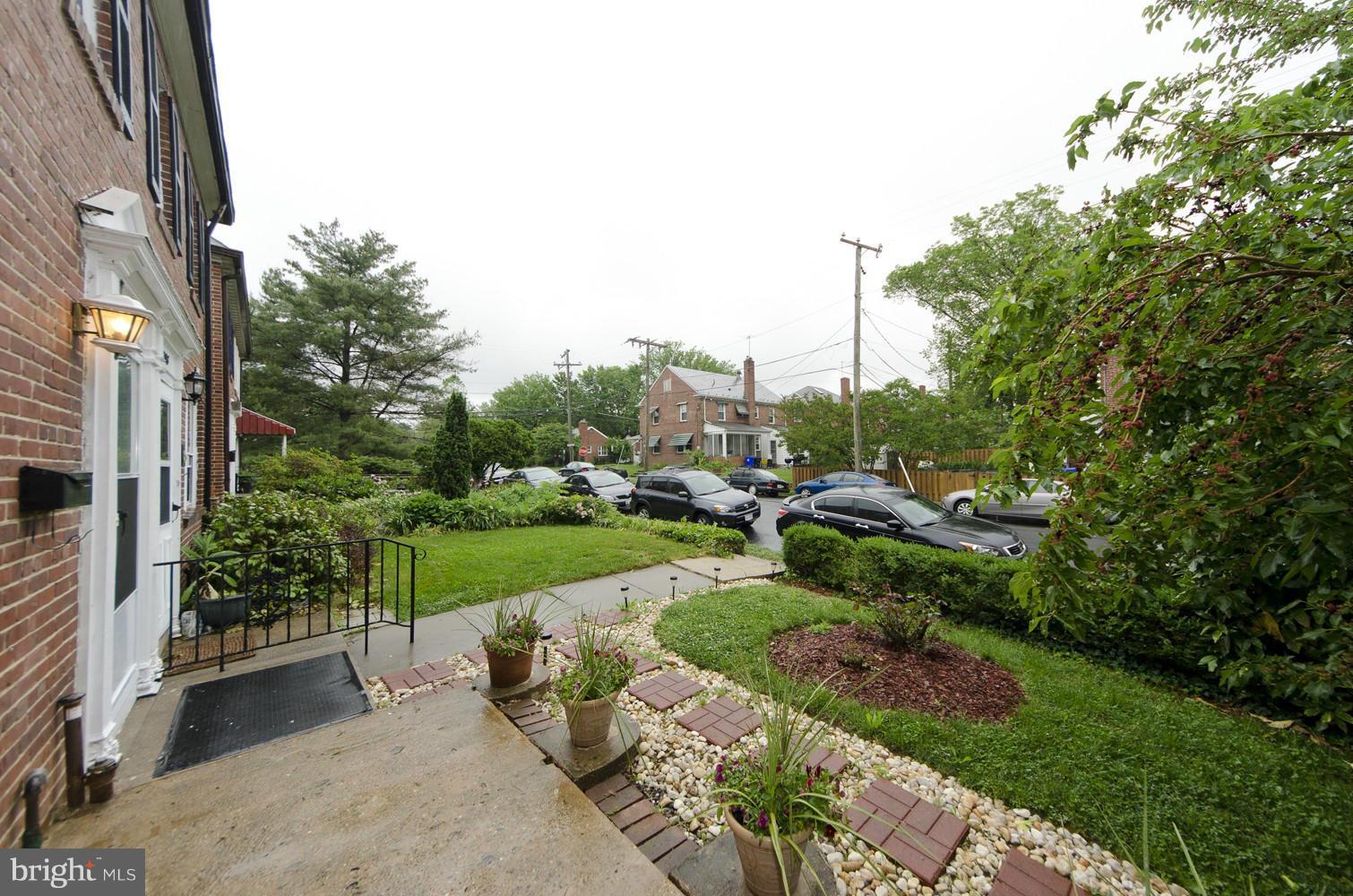 2016 North Troy Street Arlington, VA 22201 - Photo 22 of 25 a view of a garden with a building in the background
