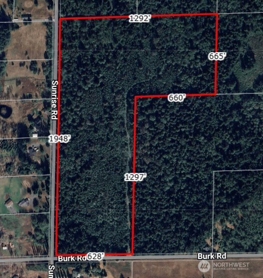 2046 Burk Road Blaine, WA 98230 - Photo 2 of 16 a street sign on a pole on a street