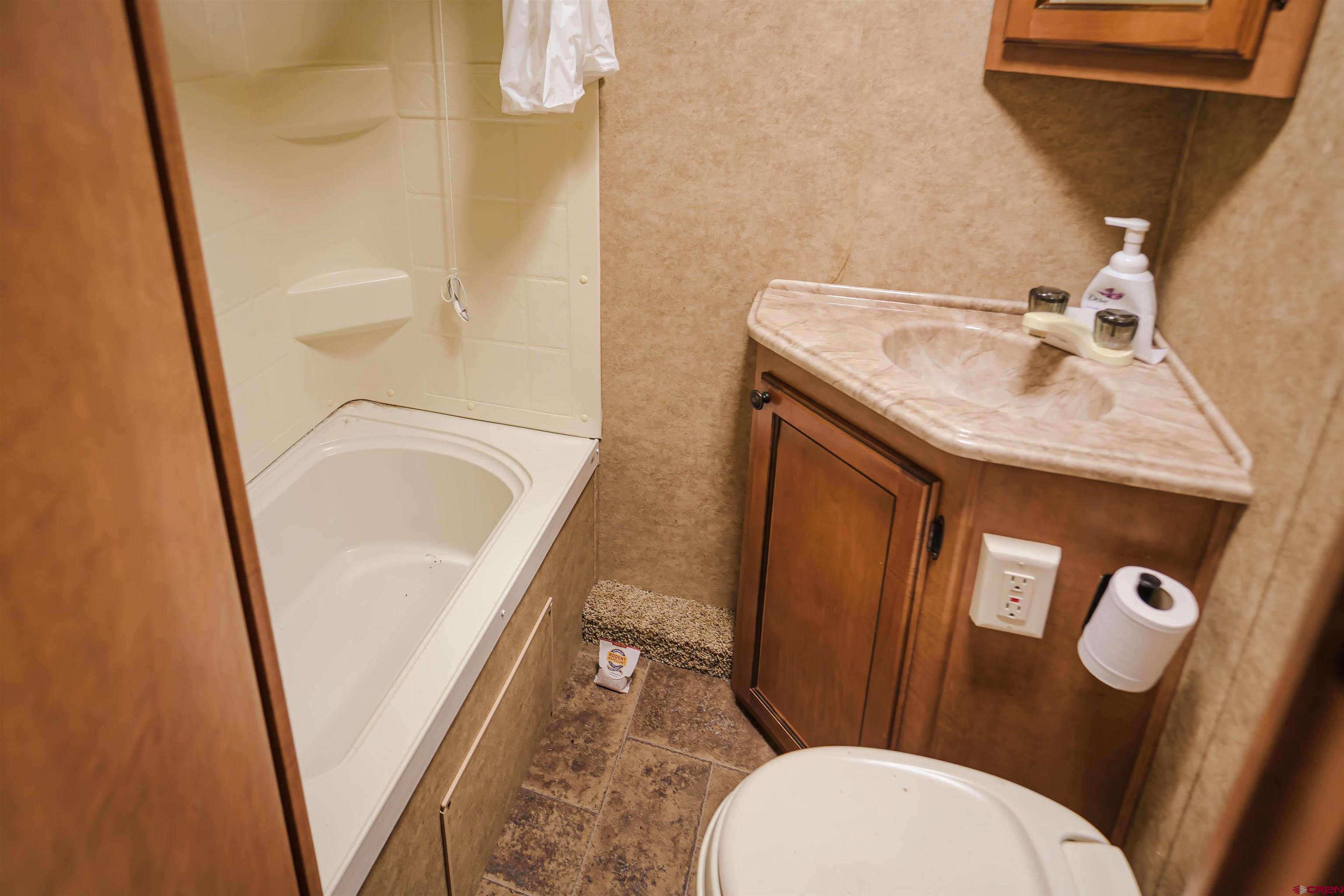 17990 Kings Road Weston, CO 81091 - Photo 32 of 45 a bathroom with a sink and toilet