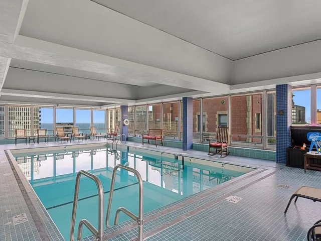 a room with lots of table and chairs