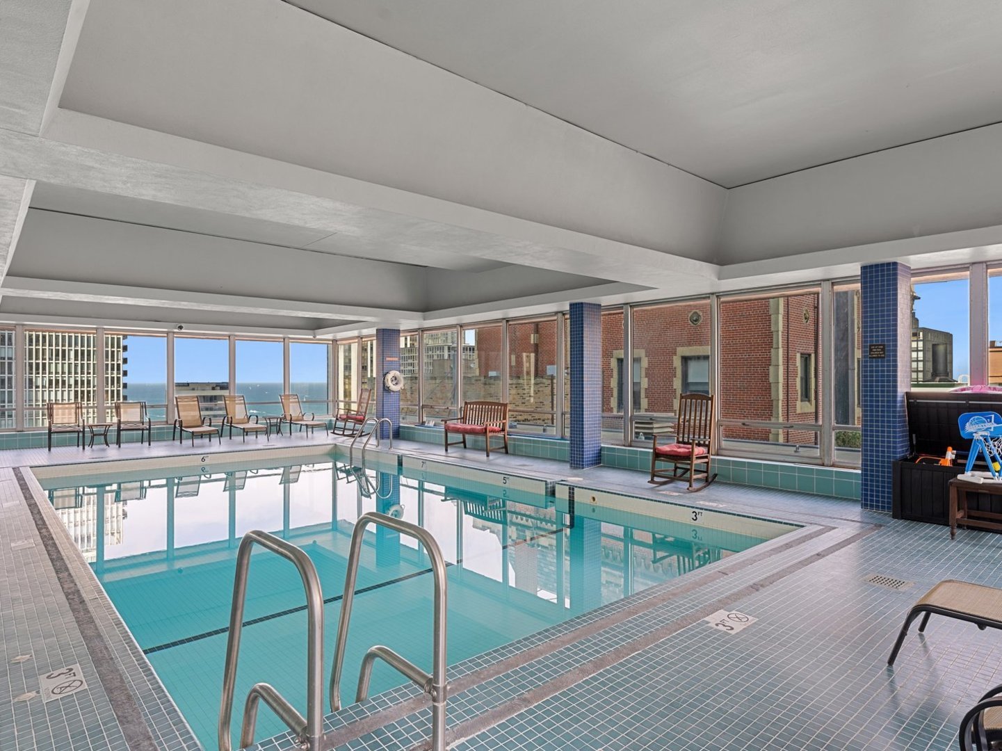 201 East Chestnut Street, Unit 23A Chicago, IL 60611 - Photo 19 of 21 a room with lots of table and chairs