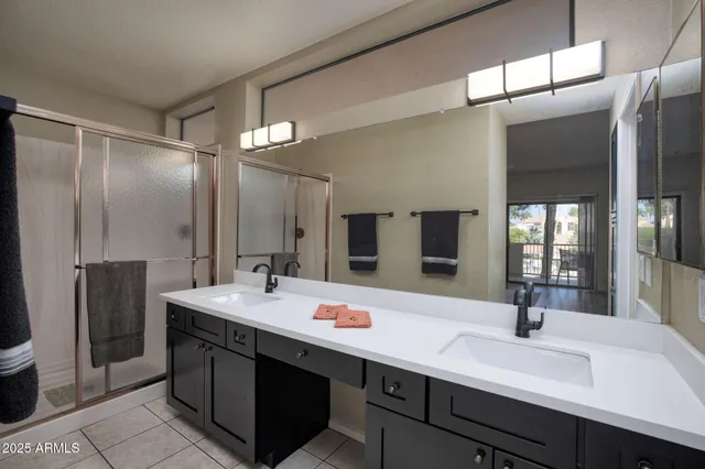 a bathroom with a washer and dryer