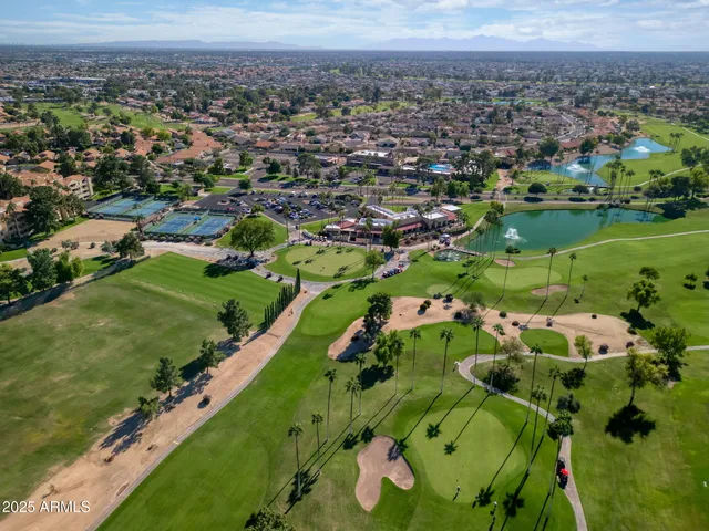 an aerial view of a city with lots of residential buildings