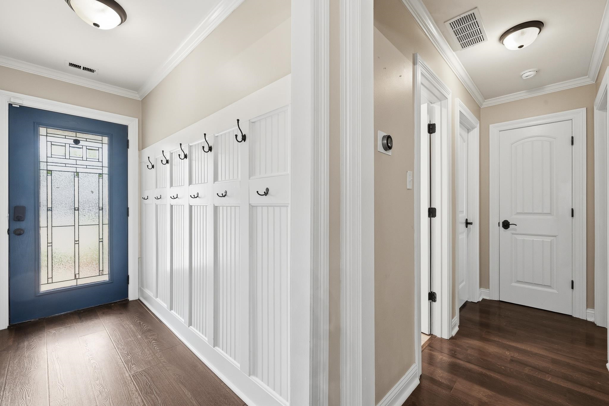 1234 Greenview Road Collierville, TN 38017 - Photo 27 of 33 a view of a hallway with wooden floor and closet area