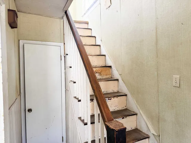 a view of entryway with wooden floor