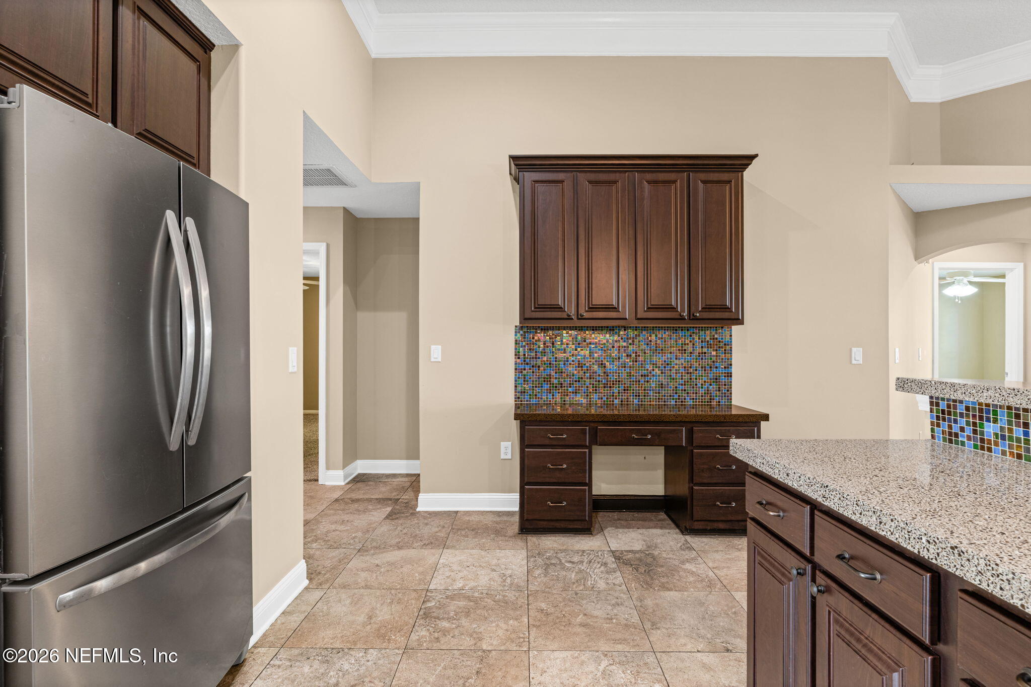 1600 Spring Water Court Fleming Island, FL 32003 - Photo 29 of 85 a view of open kitchen with granite countertop a refrigerator and a sink