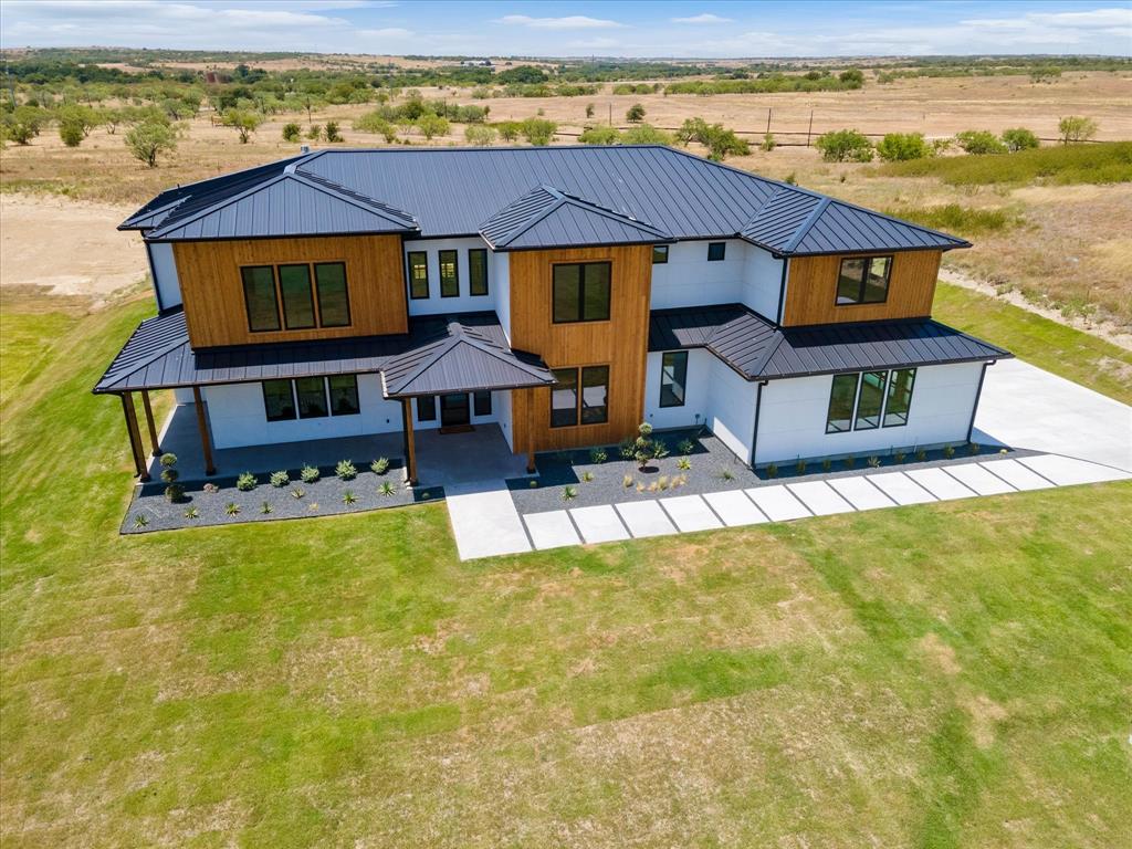 211 High View Trail Aledo, TX 76008 - Photo 1 of 1 a view of a house with pool and chairs