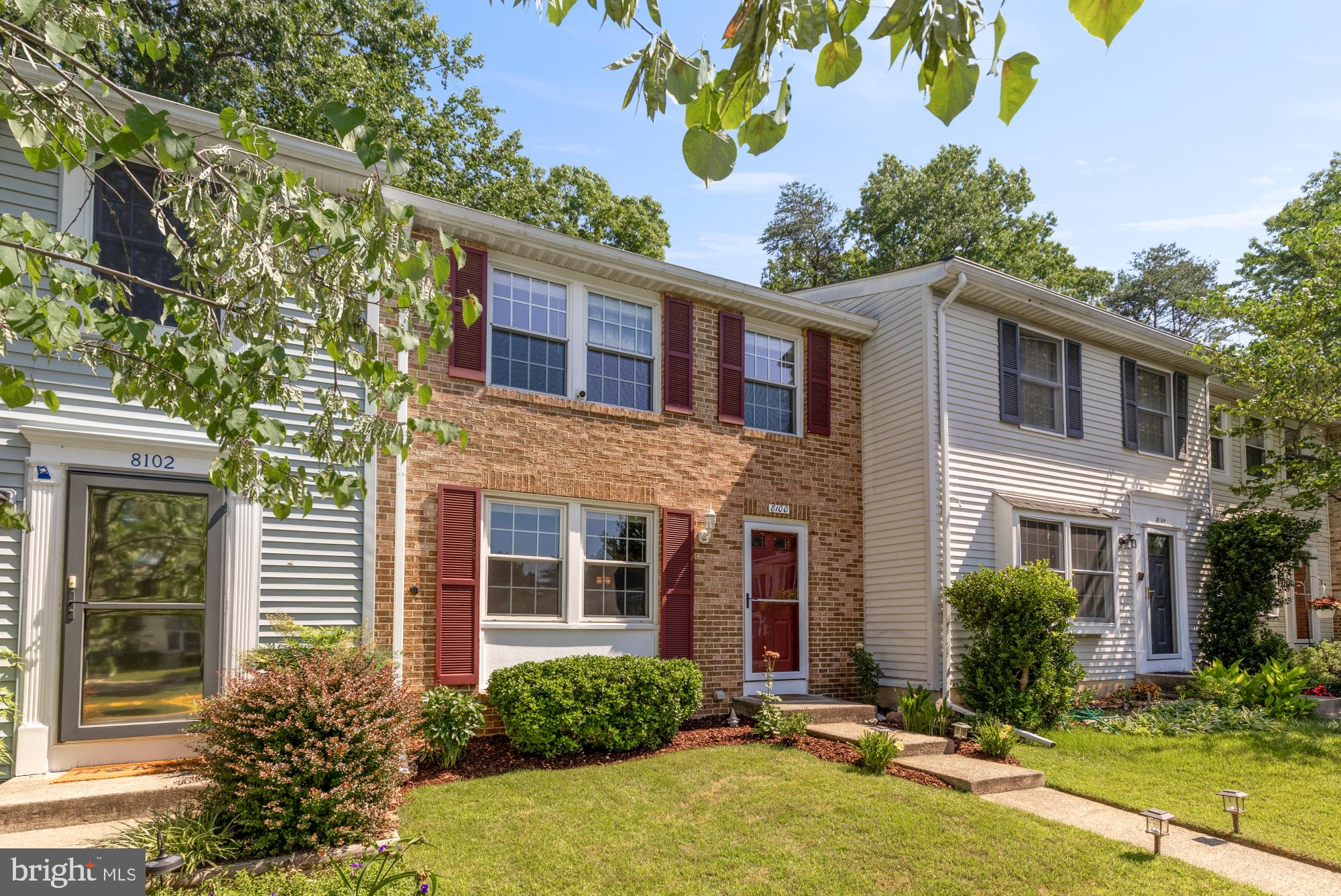 8100 Loving Forest Court Springfield, VA 22153 - Photo 1 of 33 a front view of a house with a yard
