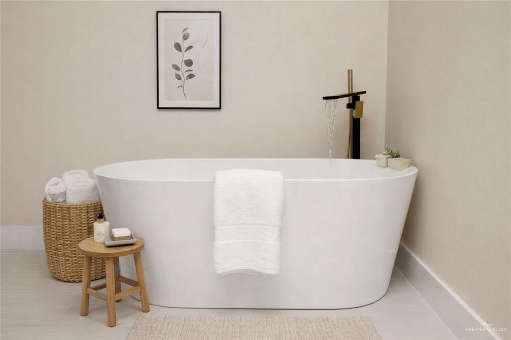 7820 North 38th Street McAllen, TX 78504 - Photo 19 of 31 Full bath featuring a freestanding bath and tile patterned floors