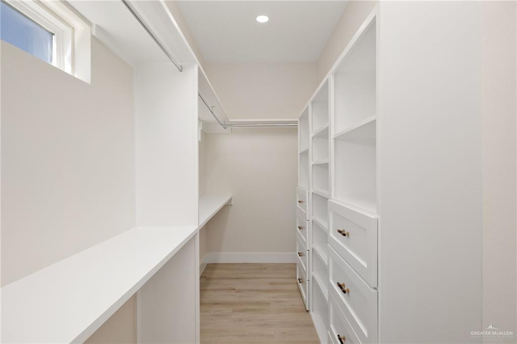 7820 North 38th Street McAllen, TX 78504 - Photo 20 of 31 Walk in closet with light wood-type flooring