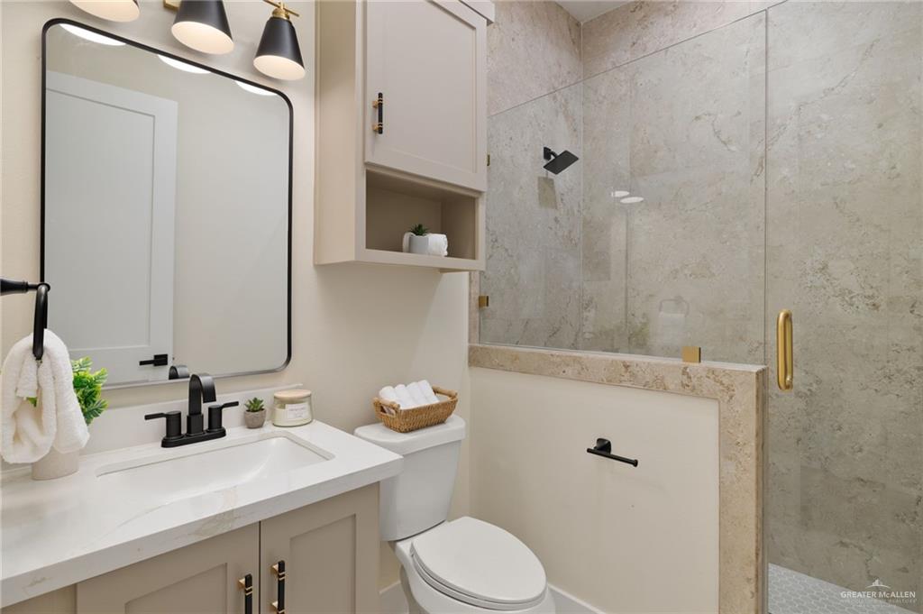 7820 North 38th Street McAllen, TX 78504 - Photo 26 of 31 Full bath with a shower stall and vanity