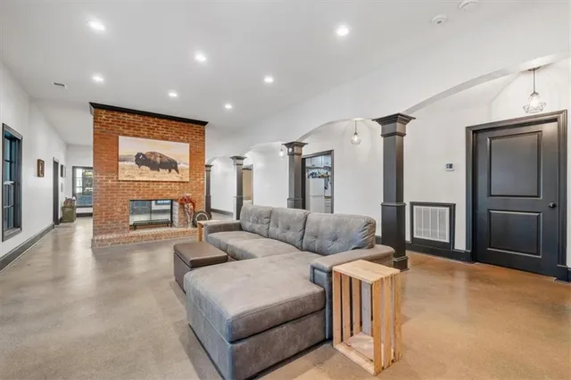 a view of an empty room with glass door