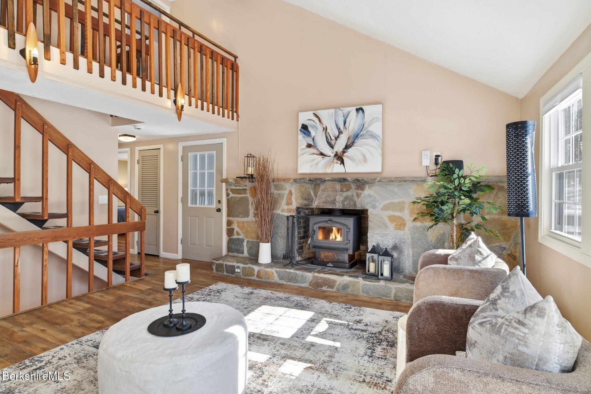 30 Gore Road Blandford, MA 01008 - Photo 2 of 61 a living room with furniture and a fireplace