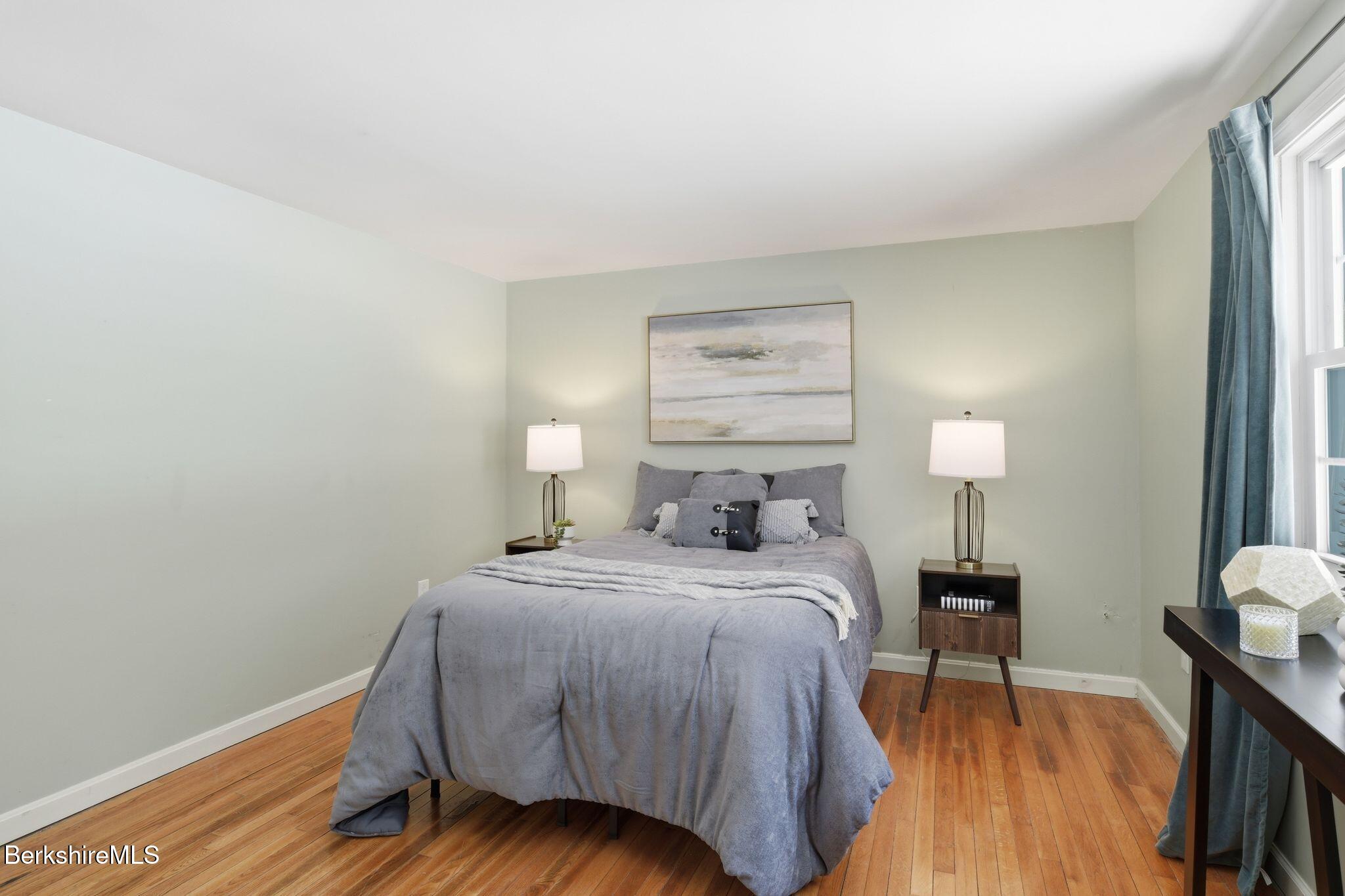 30 Gore Road Blandford, MA 01008 - Photo 21 of 61 a bedroom with a bed and a table