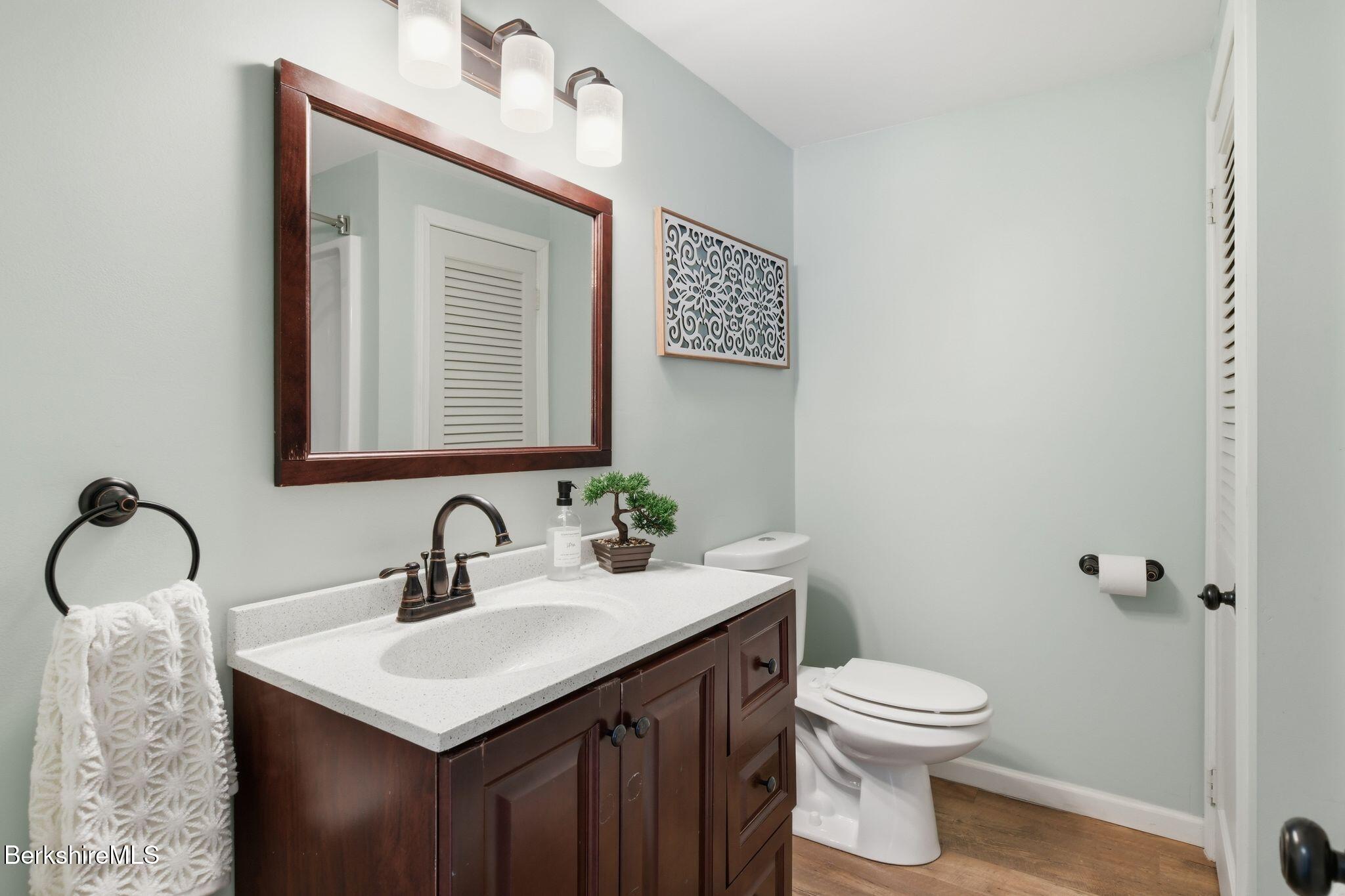 30 Gore Road Blandford, MA 01008 - Photo 26 of 61 a bathroom with a sink vanity mirror and toilet