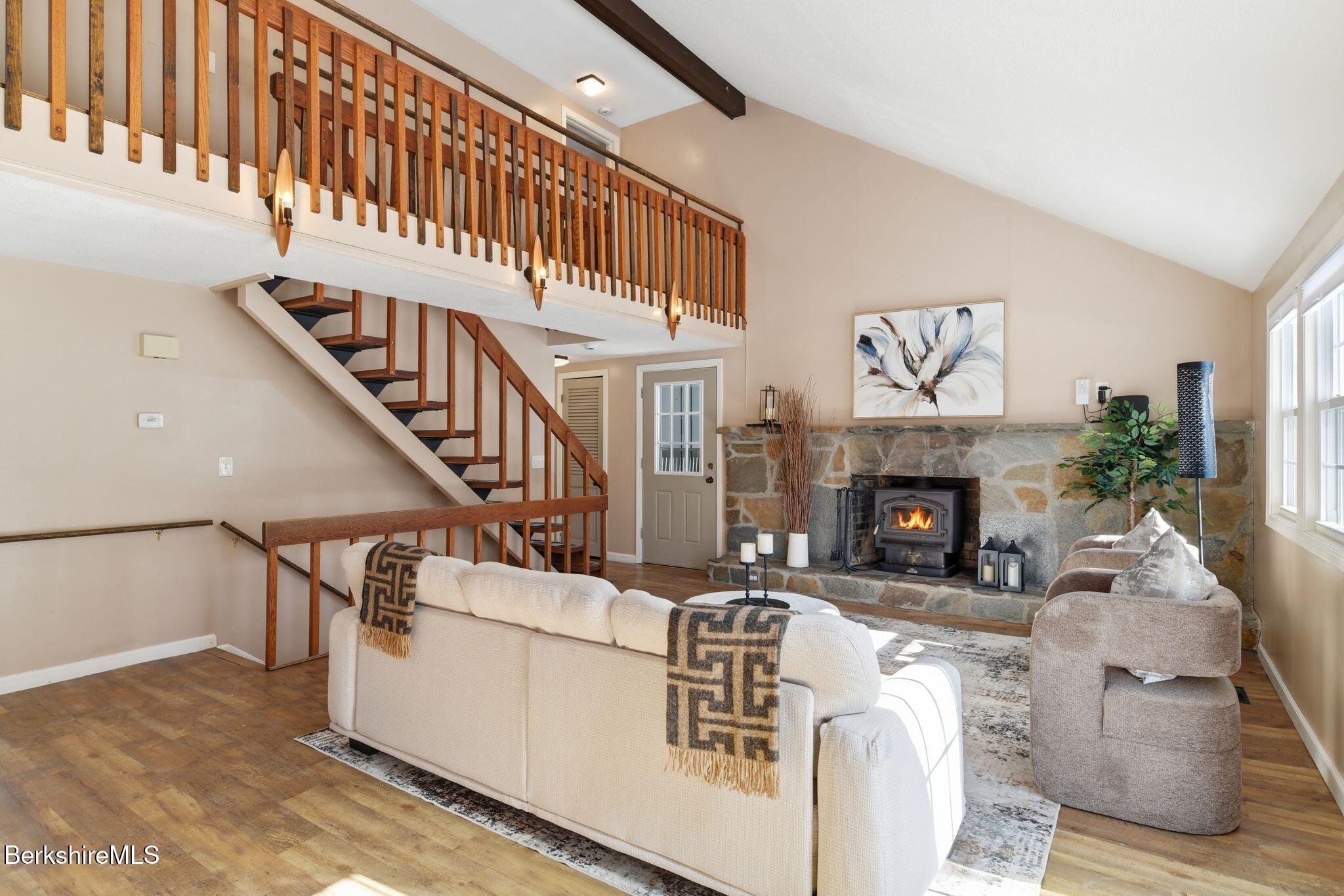 30 Gore Road Blandford, MA 01008 - Photo 4 of 61 a living room with furniture and a fireplace