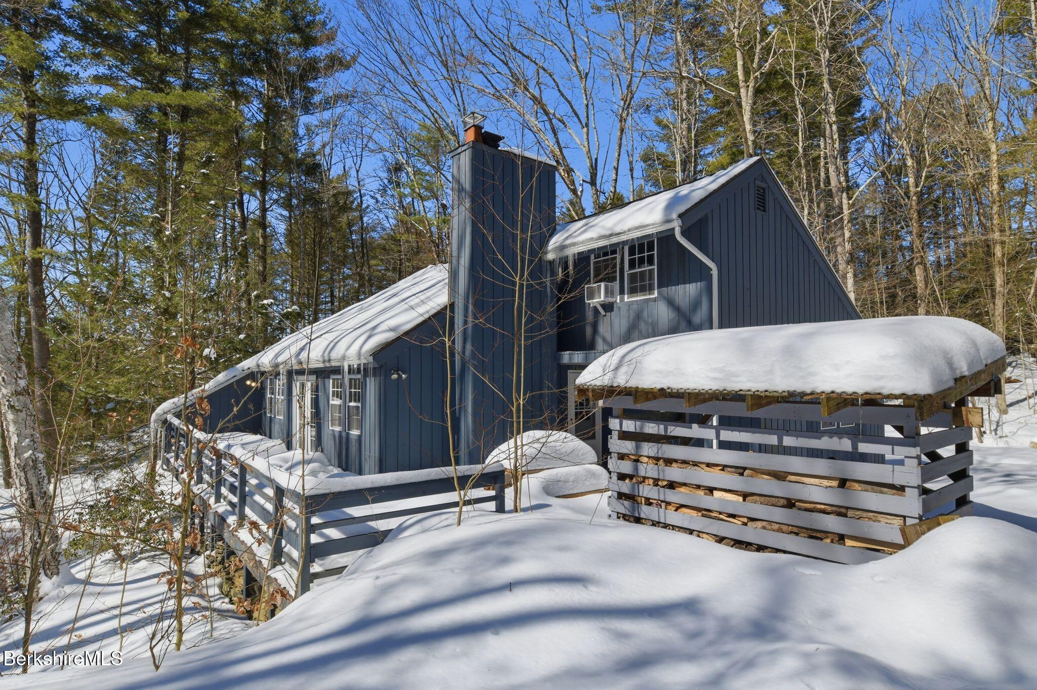 30 Gore Road Blandford, MA 01008 - Photo 58 of 61 a view of house with a yard and wooden fence