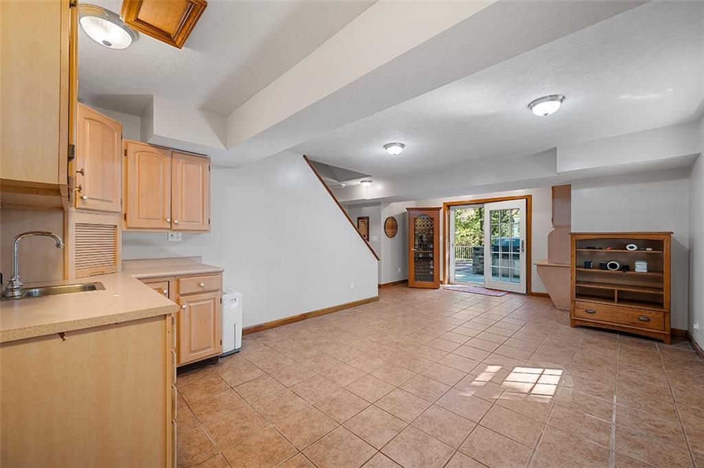 409 Bryn Court Pittsburgh, PA 15237 - Photo 34 of 50 a view of a kitchen with a sink and dishwasher next to a window