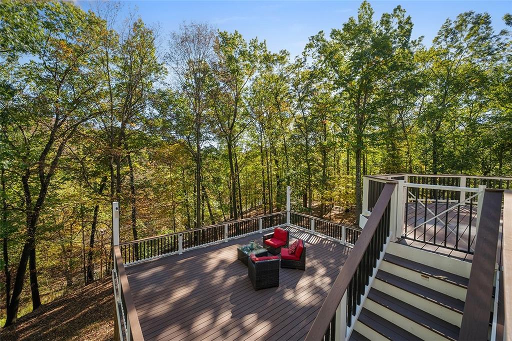 409 Bryn Court Pittsburgh, PA 15237 - Photo 41 of 50 a view of a balcony with wooden floor and fence