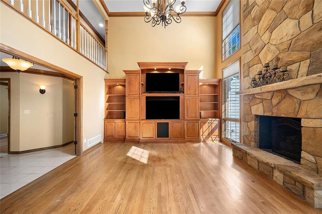 409 Bryn Court Pittsburgh, PA 15237 - Photo 8 of 50 a living room with furniture and a fireplace