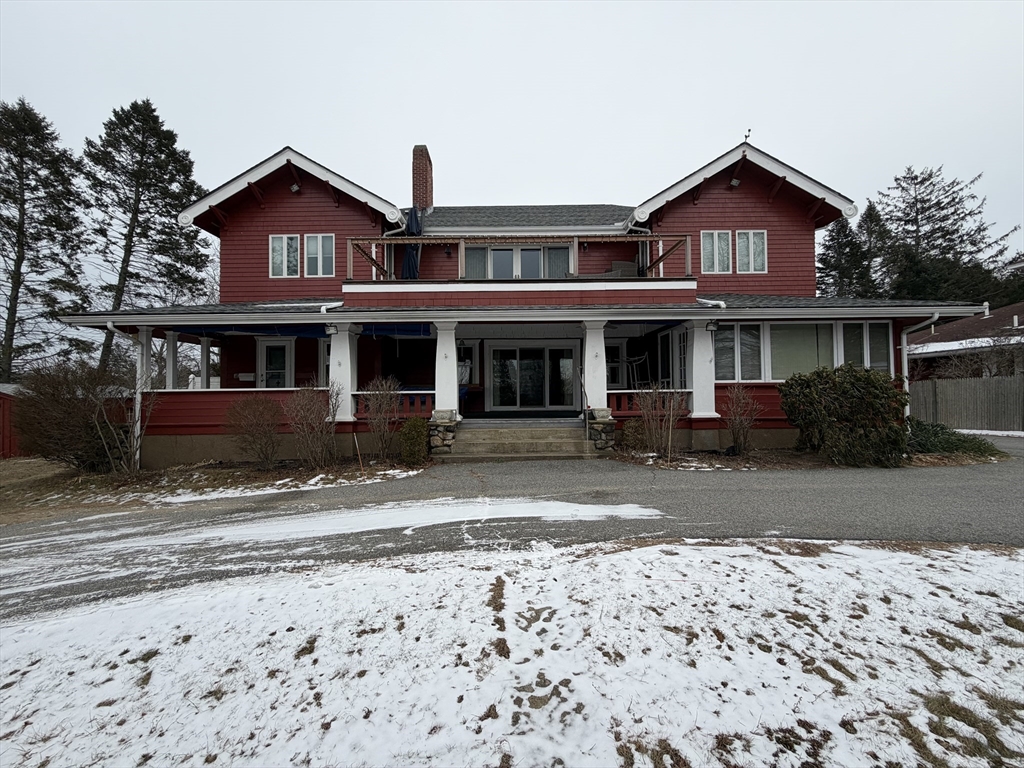 630 Washington Street, Unit 1 Gloucester, MA 01930 - Photo 27 of 28 a front view of a house with a yard
