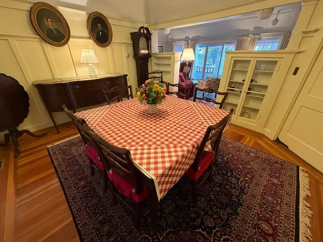 a dining room table with chairs