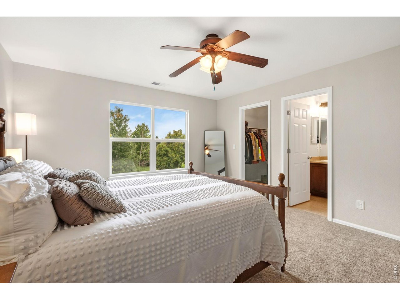 600 Botley Drive Windsor, CO 80550 - Photo 23 of 40 Bedroom 2 has ensuite full bath and walk in closet