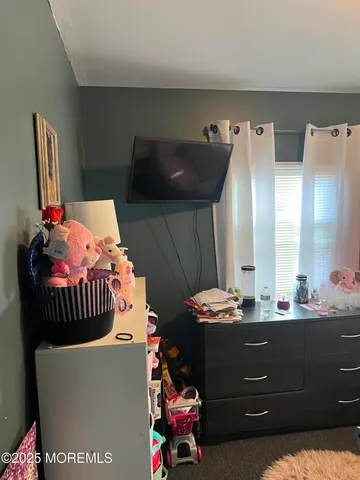 a room with furniture and a mirror