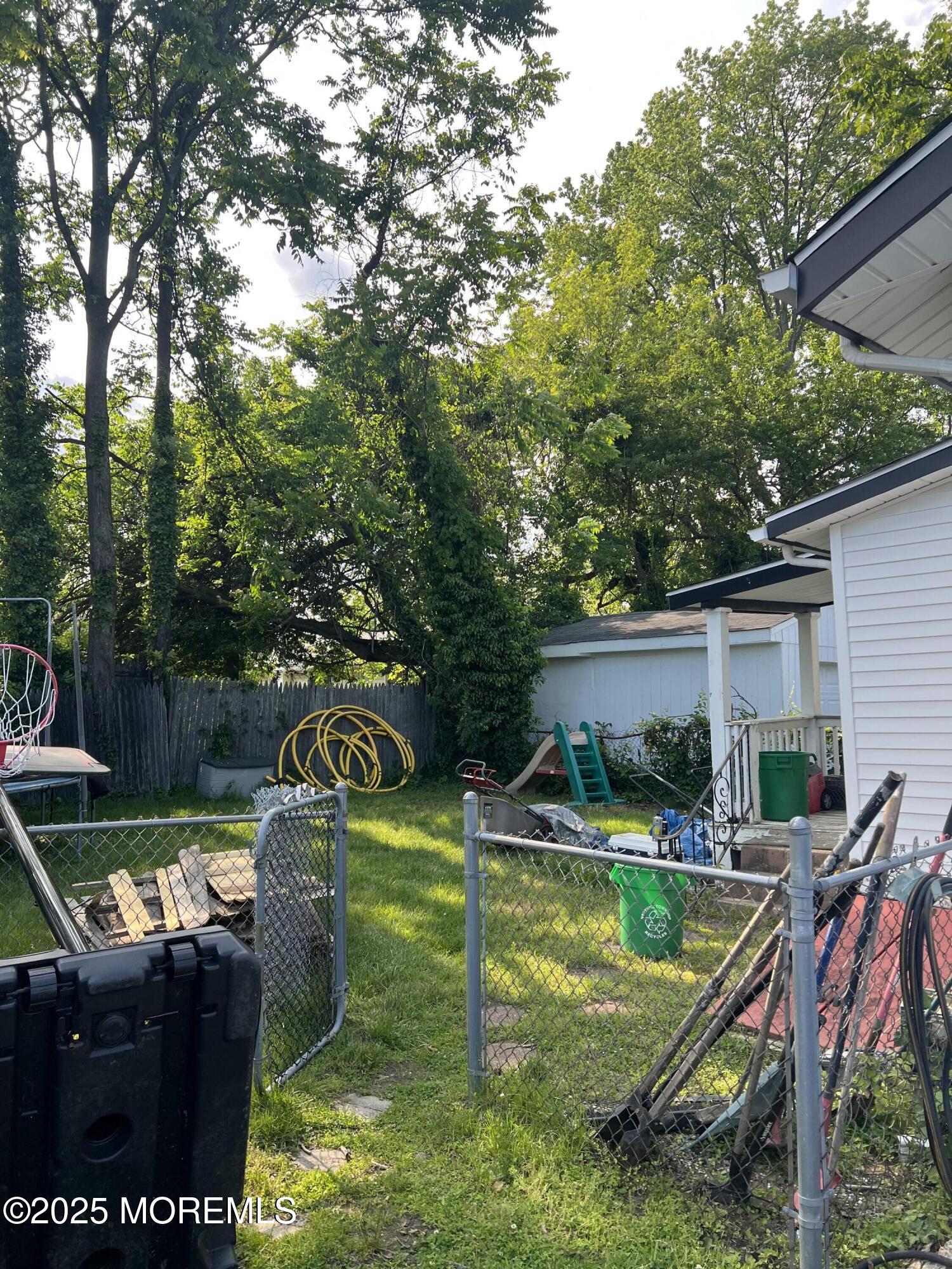 126 Leonard Avenue Neptune, NJ 07753 - Photo 27 of 27 a view of a house with pool
