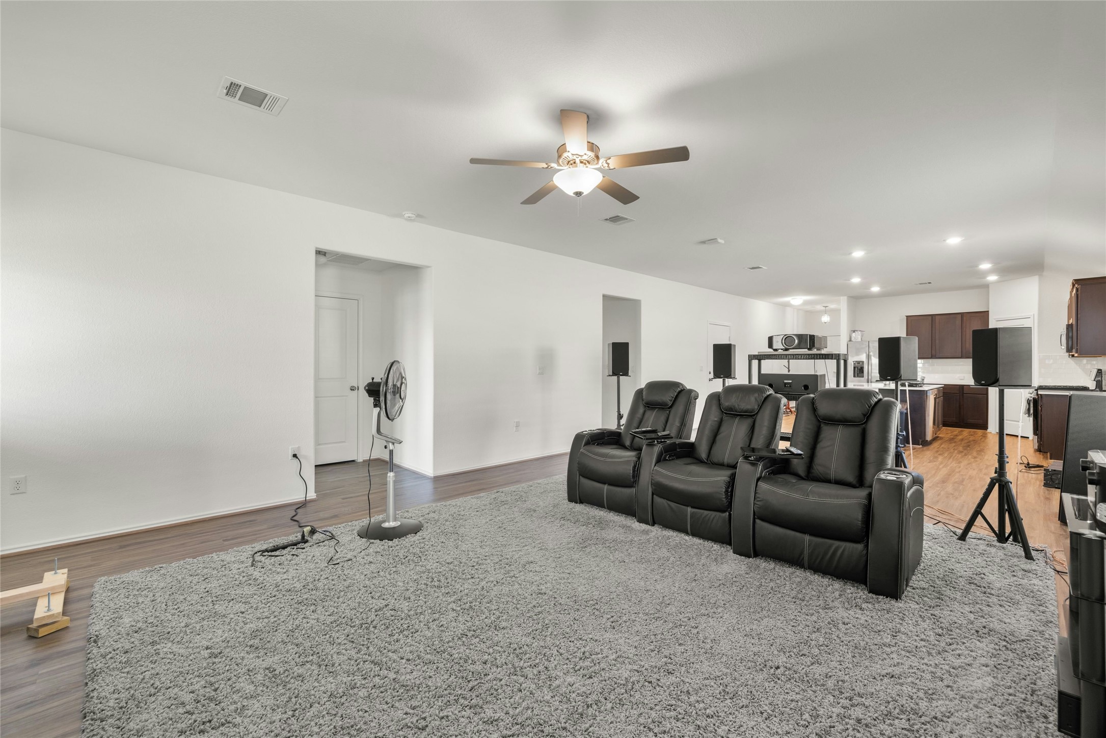 11813 Roscommon Trail Austin, TX 78754 - Photo 9 of 28 a living room with furniture and a view of kitchen