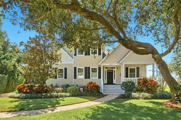 front view of a house with a yard