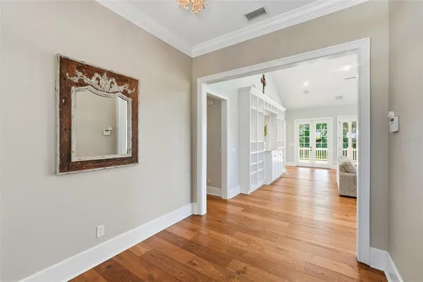 a living room with furniture fireplace and flat screen tv