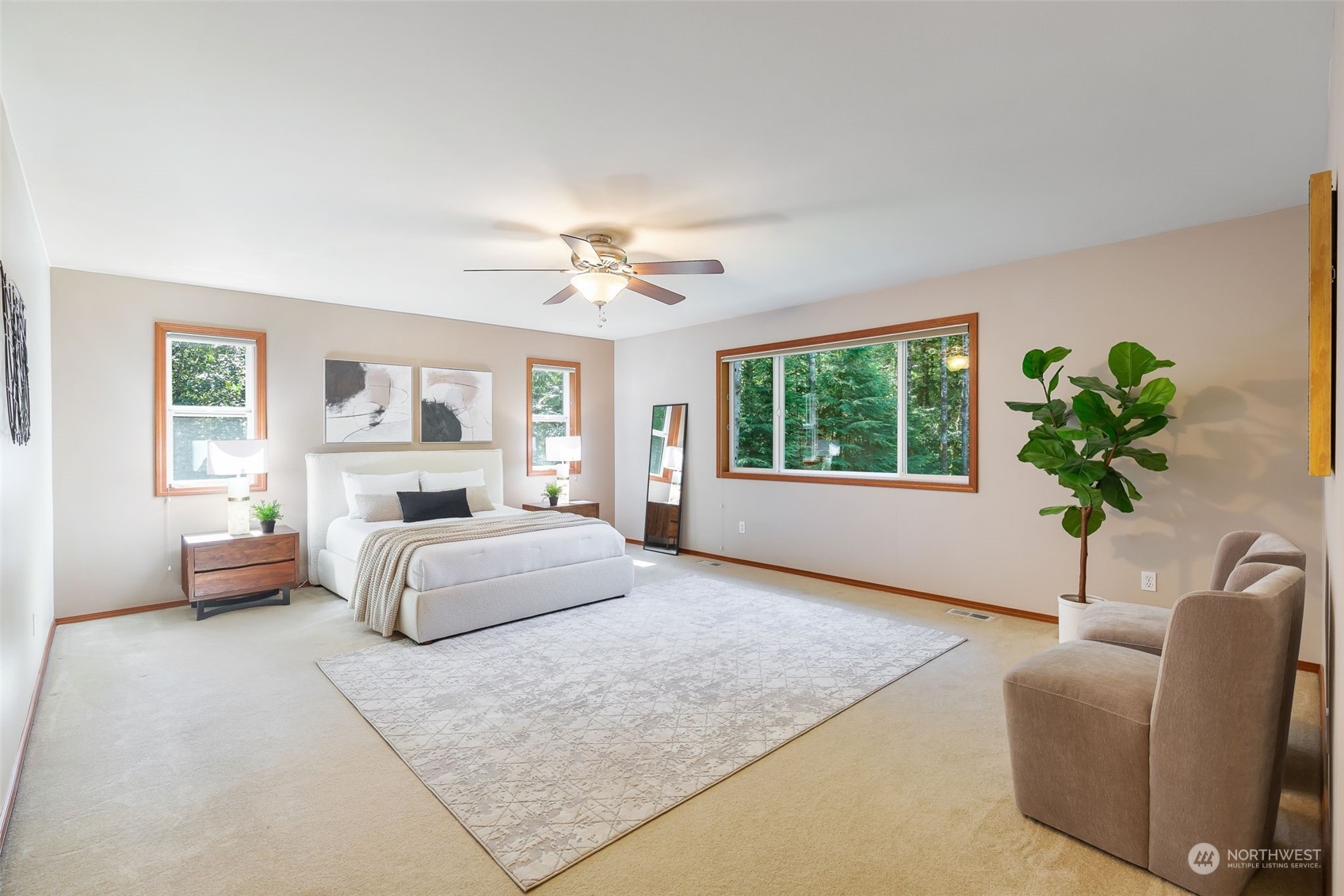 11227 Upper Preston Road Southeast Issaquah, WA 98027 - Photo 11 of 27 a bedroom with a large bed and a window
