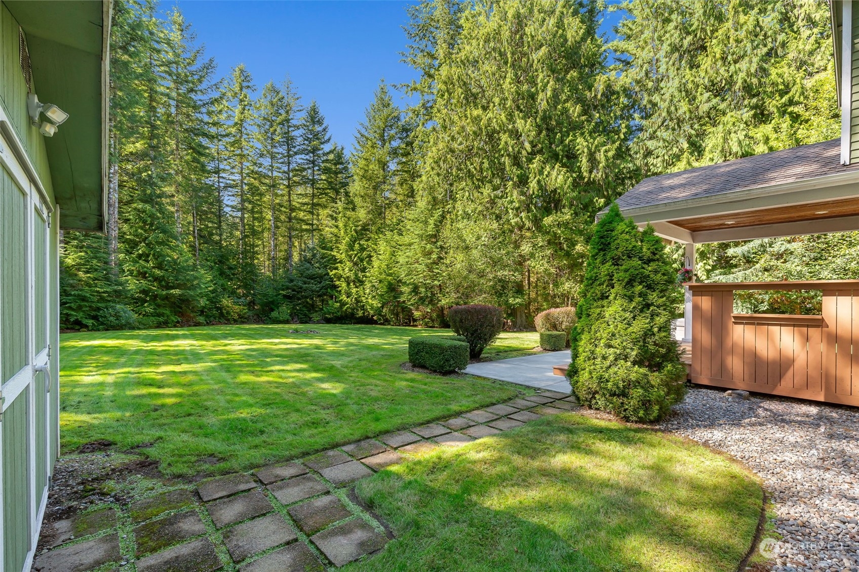 11227 Upper Preston Road Southeast Issaquah, WA 98027 - Photo 20 of 27 a view of a backyard with plants and a backyard