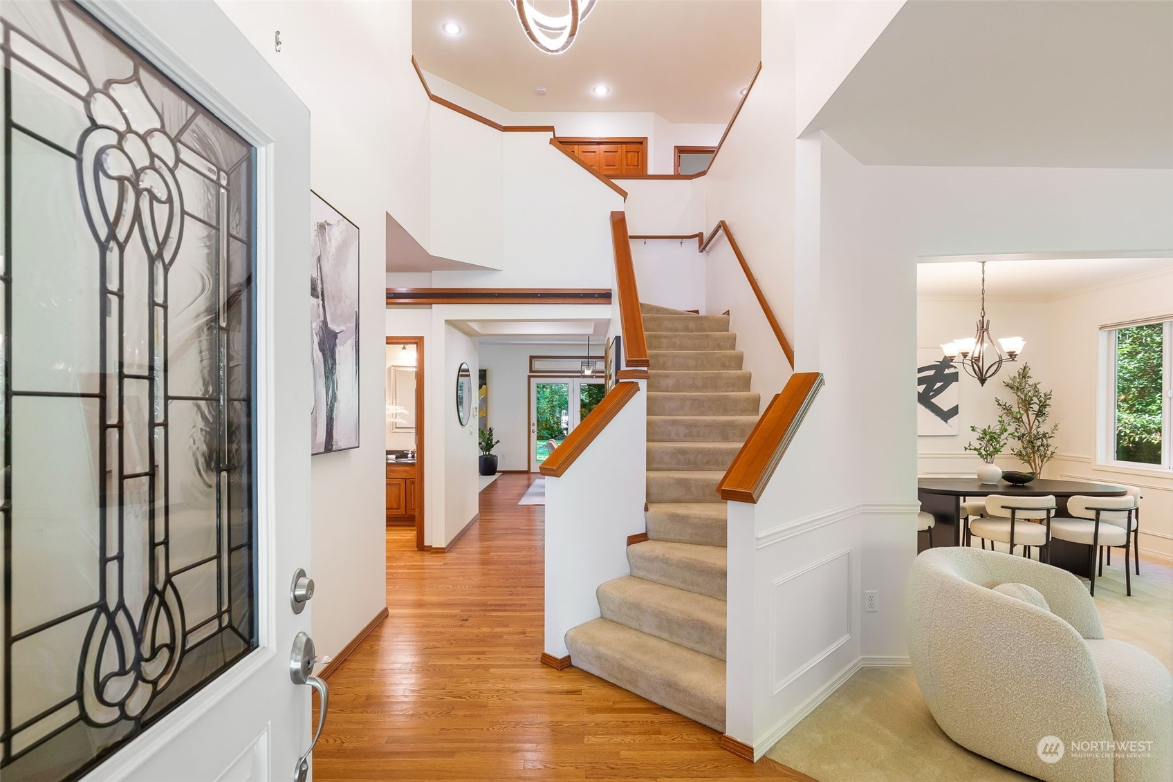 11227 Upper Preston Road Southeast Issaquah, WA 98027 - Photo 4 of 27 a view of entryway and hall with wooden floor