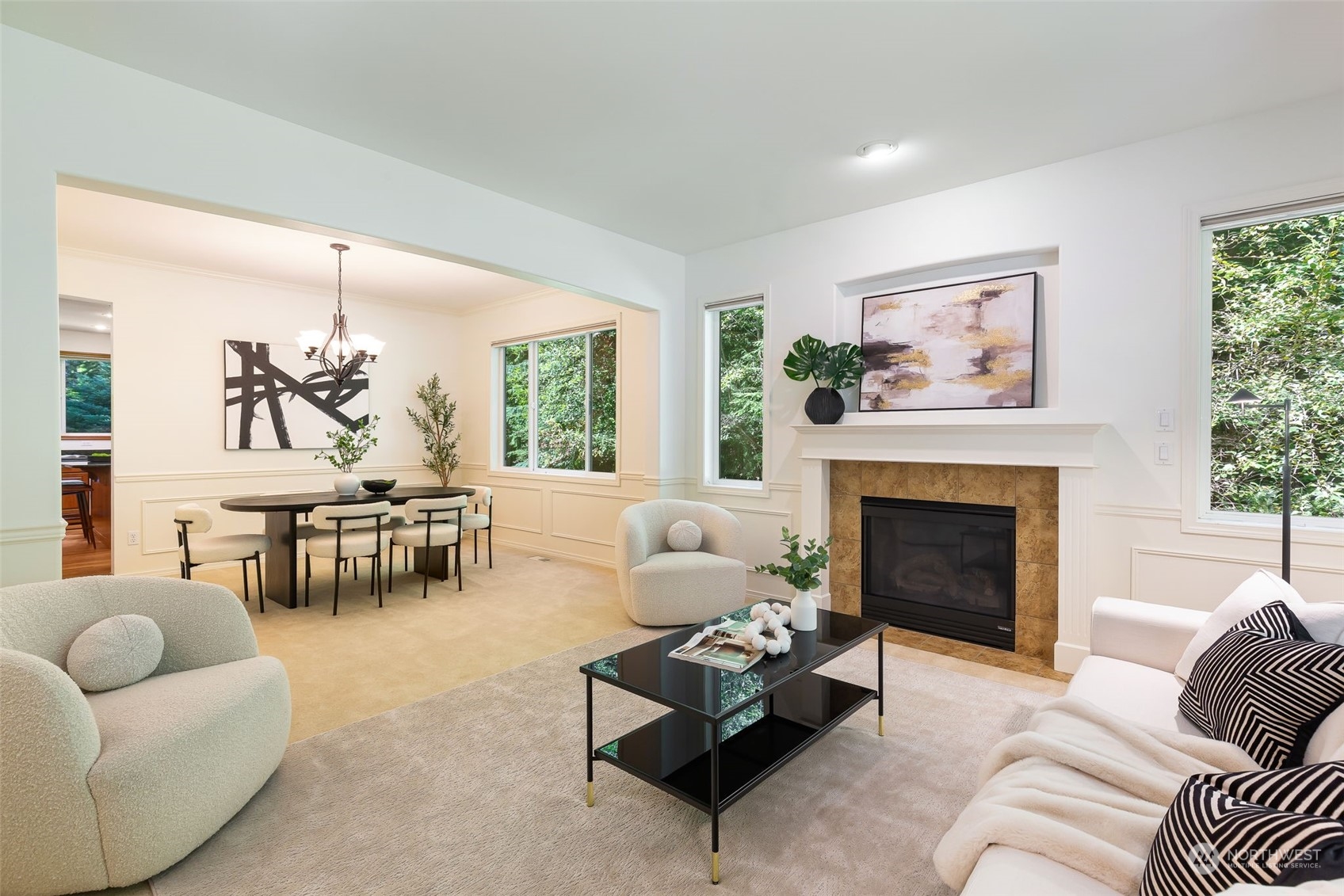 11227 Upper Preston Road Southeast Issaquah, WA 98027 - Photo 5 of 27 a living room with furniture and a fireplace