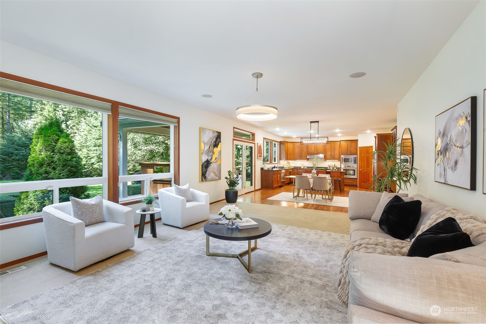 11227 Upper Preston Road Southeast Issaquah, WA 98027 - Photo 10 of 27 a living room with furniture and a large window