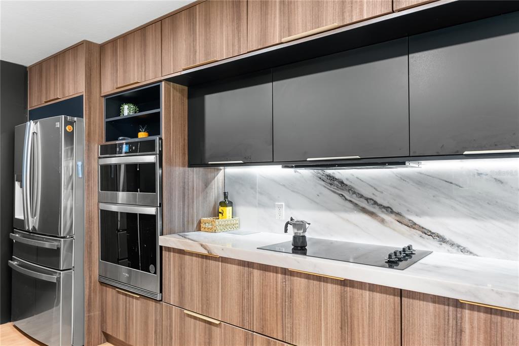 20107 Starry Street Orlando, FL 32833 - Photo 13 of 59 a kitchen with refrigerator and cabinets