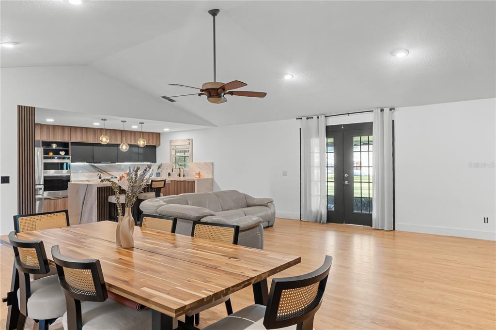 20107 Starry Street Orlando, FL 32833 - Photo 17 of 59 a view of a dining room with furniture