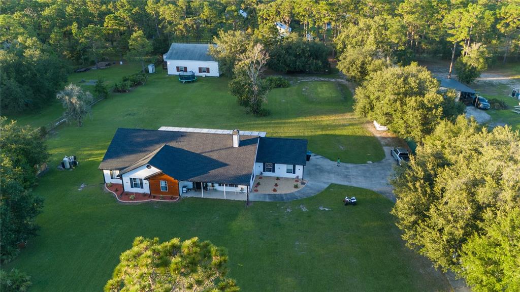 20107 Starry Street Orlando, FL 32833 - Photo 3 of 59 a view of a house with a yard