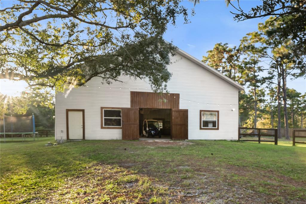 20107 Starry Street Orlando, FL 32833 - Photo 36 of 59 a view of a house with a yard