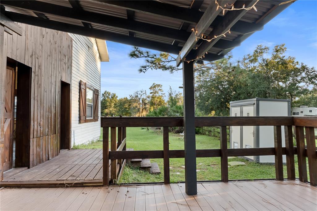 20107 Starry Street Orlando, FL 32833 - Photo 41 of 59 a view of porch with a furniture