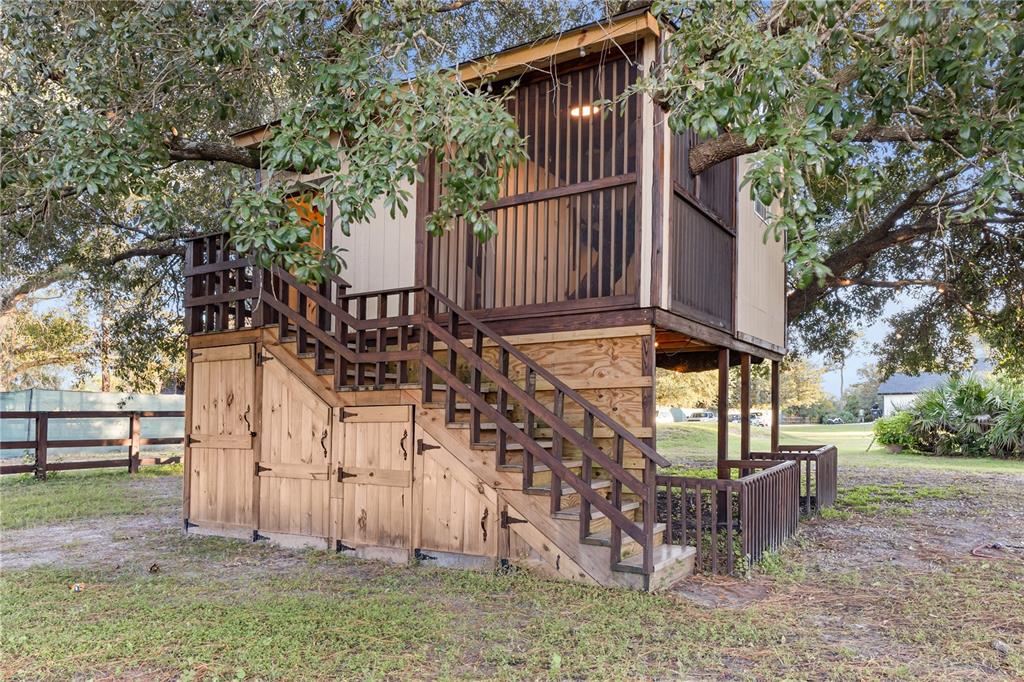 20107 Starry Street Orlando, FL 32833 - Photo 43 of 59 a view of a house with a wooden fence