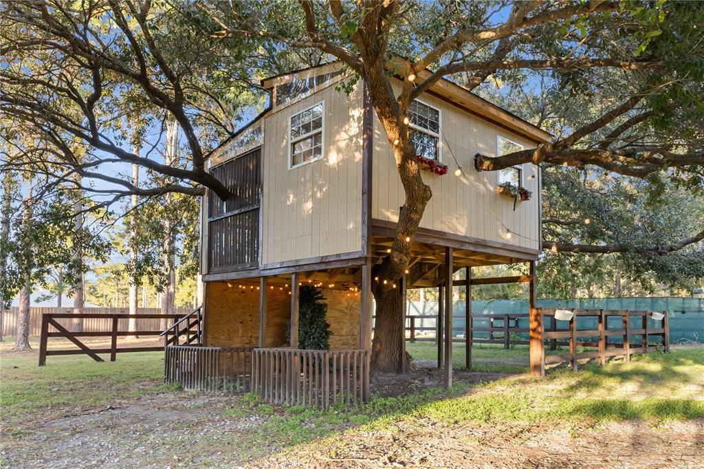 20107 Starry Street Orlando, FL 32833 - Photo 44 of 59 a view of a house with a yard and sitting area