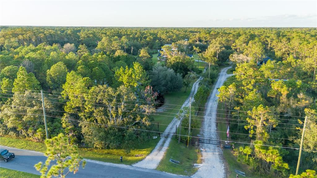 20107 Starry Street Orlando, FL 32833 - Photo 50 of 59 an aerial view of residential houses with outdoor space and trees