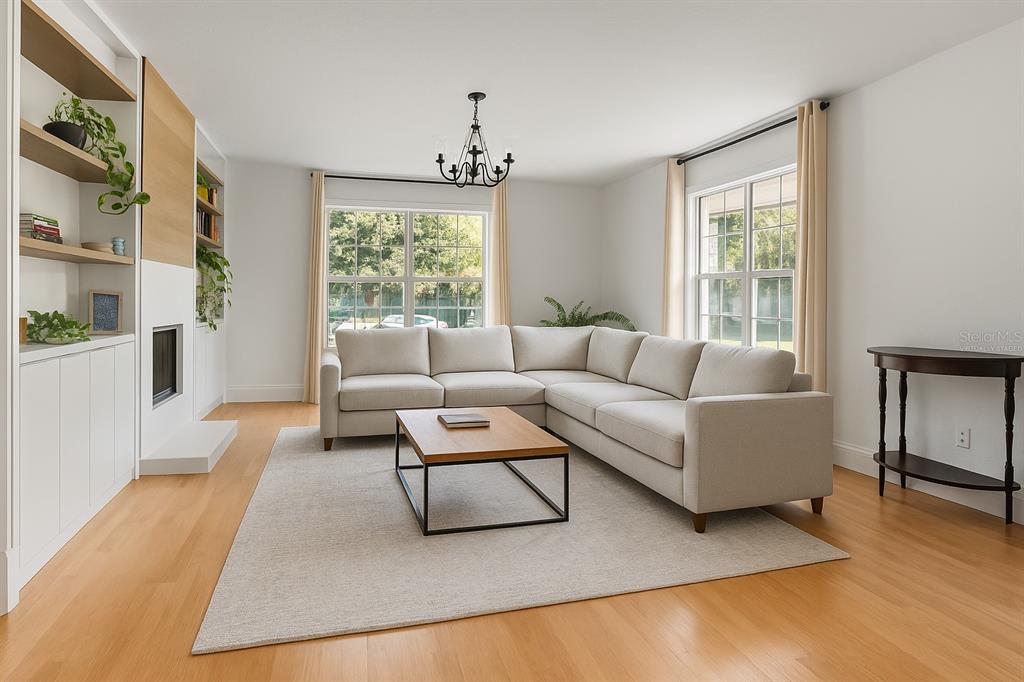 20107 Starry Street Orlando, FL 32833 - Photo 6 of 59 a living room with furniture and a large window