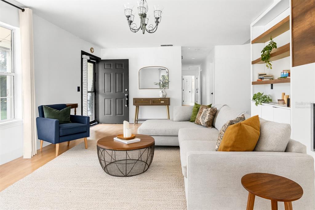 20107 Starry Street Orlando, FL 32833 - Photo 8 of 59 a living room with furniture and a large window