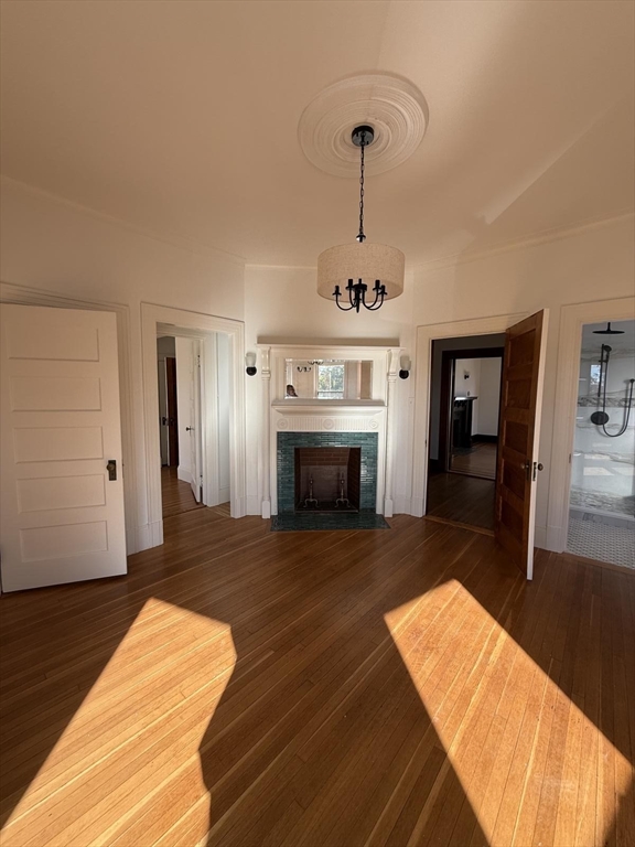 72 Belmont Street, Unit 1 Fall River, MA 02720 - Photo 14 of 20 a living room with furniture and a fireplace