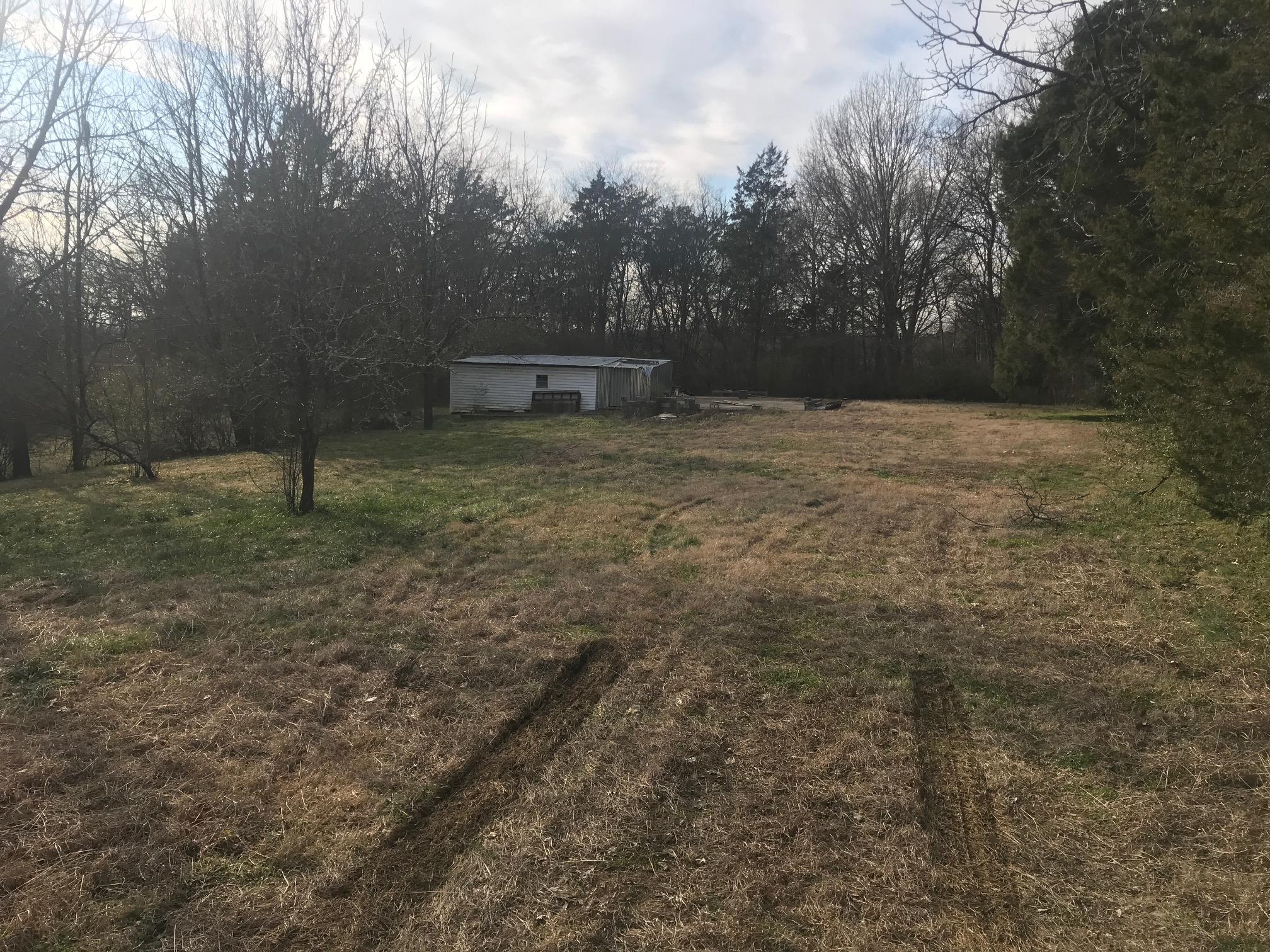 620 Larkin Springs Road Madison, TN 37115 - Photo 1 of 5 a backyard of a house with lots of green space
