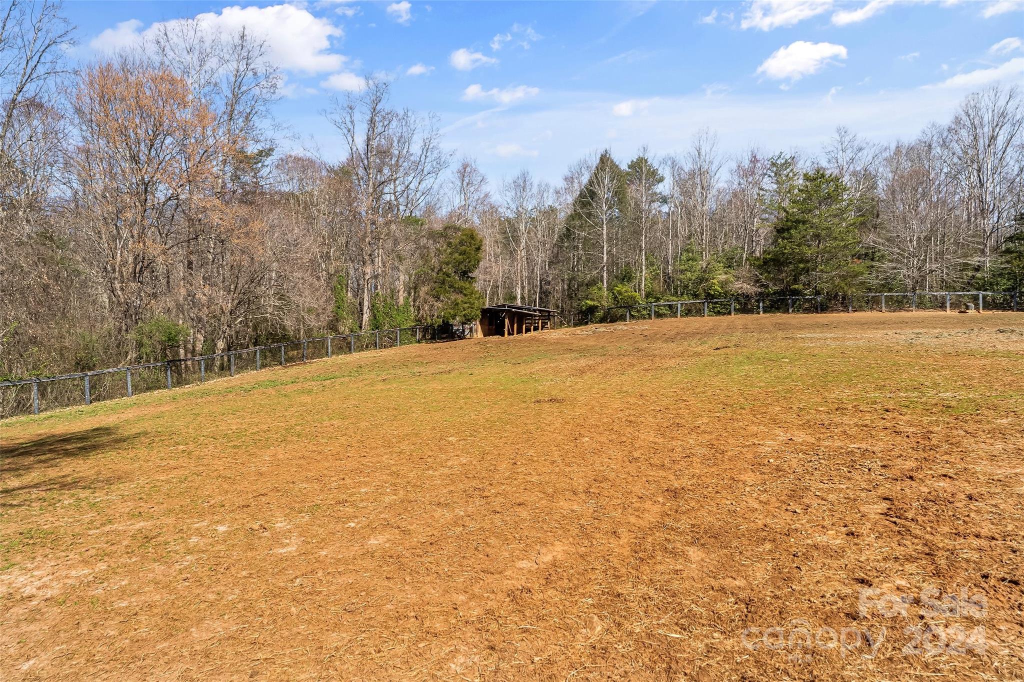 10845 Traphill Road Traphill, NC 28685 - Photo 44 of 48 a view of an ocean beach and trees in the background